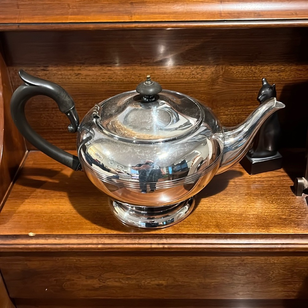 Nice silver plate coffee pot for display.